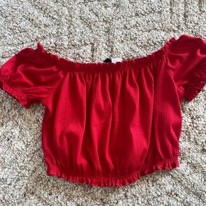 off the shoulder red cropped shirt